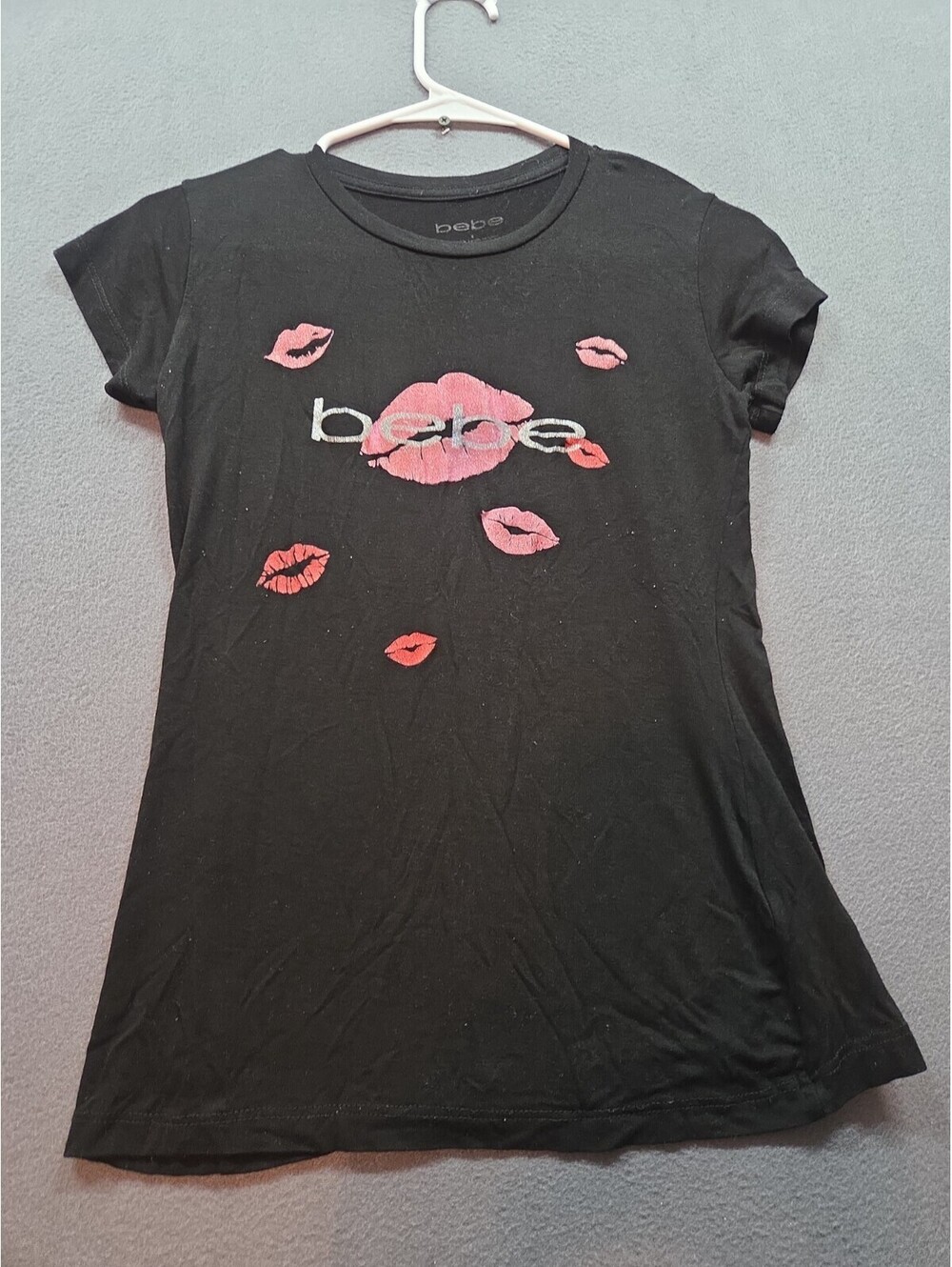 women's black shirt by Bebe size S